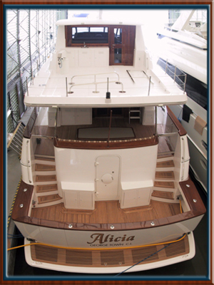 Teak decking, Cap rails, Doors and Table on a 90ft luxury Yacht